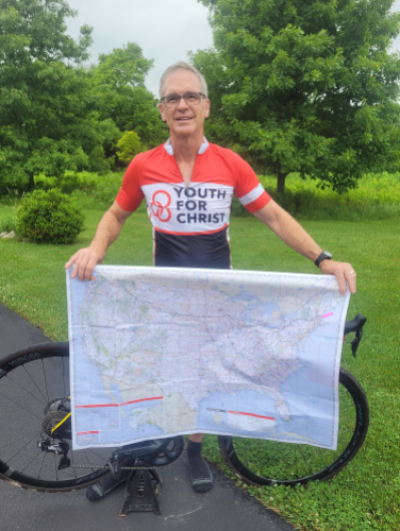 Youth for Christ board member Michael Robertson poses for a photo before biking across 14 northern states in 2021. 