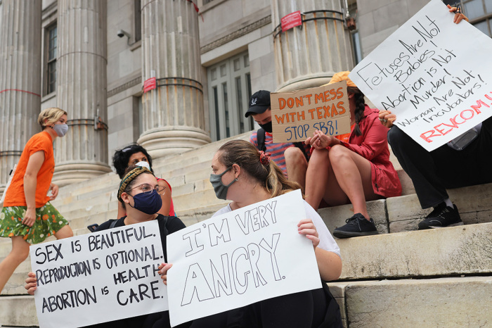 People gather for a reproductive rights rally at Brooklyn Borough Hall on September 01, 2021, in Downtown Brooklyn in New York City after Texas' 'Heartbeat Bill' went into effect.