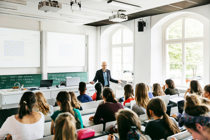 University professor addresses his students during a lecture.