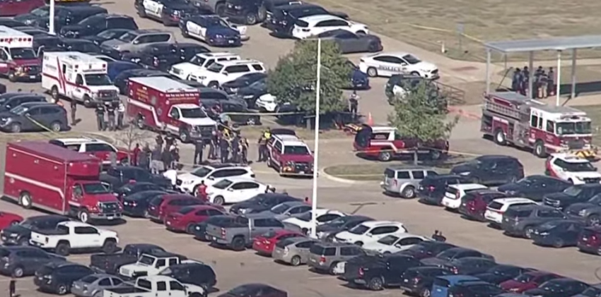 Emergency personnel respond to a shooting at Timberview High School in Arlington, Texas, on Oct. 6, 2021.