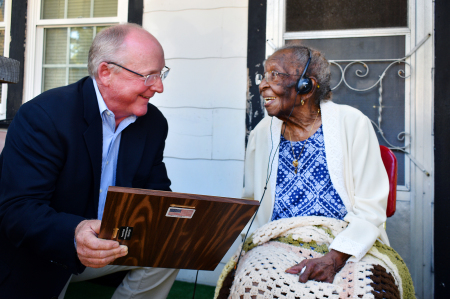 David Weiss, chair of The Clarke County Board of Supervisors, presents Viola Brown with a plaque containing the "Viola Roberts Lampkin Brown Day" proclamation on Oct. 4. 2021