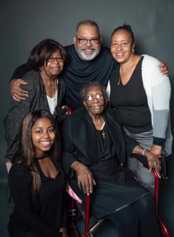 A family picture with Viola Brown: L-R seated Nyjah Davis (great granddaughter), Viola Roberts Lampkin Brown, standing Vonceil Hill (daughter), Andrew Roberts great nephew & Charceil Kellam (granddaughter)