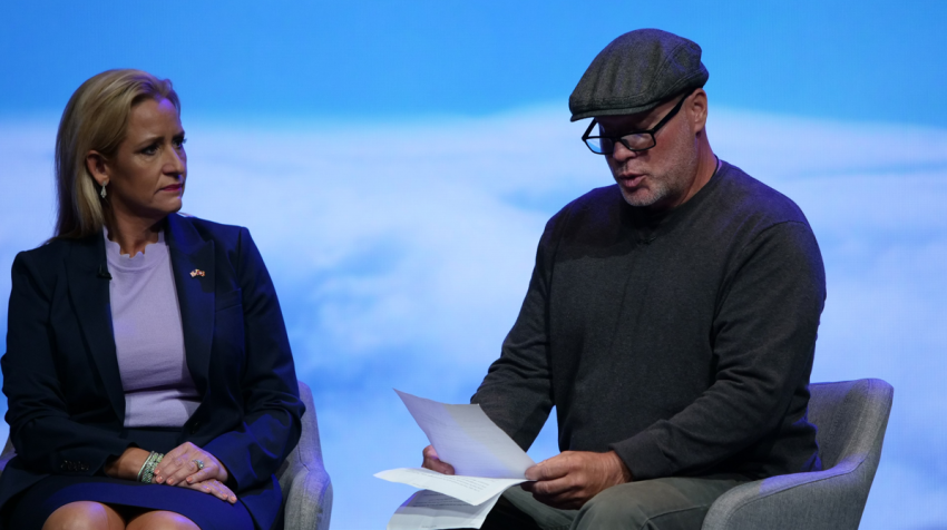Brenton Netz (L), the concerned father of a child with gender dysphoria, details how his son was convinced that he was a "transgender lesbian" at the Pray Vote Stand Summit in Leesburg, Virginia, Oct. 8, 2021. Arkansas Attorney General Leslie Rutledge looks on.