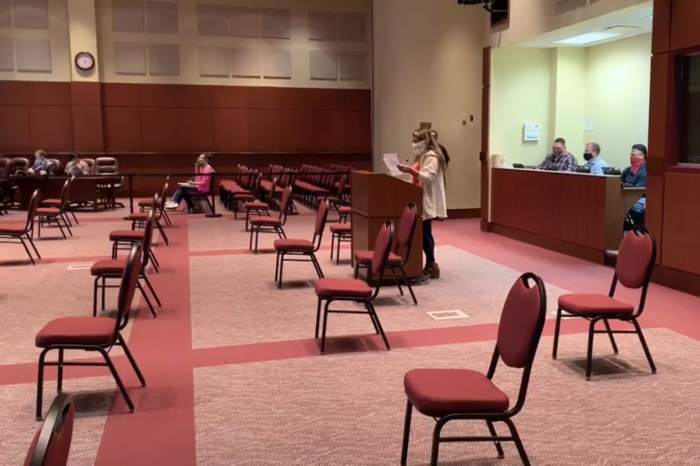 A parent speaks at a Loudoun County School Board meeting in Virginia on in October 2021 to demand the resignation of Superintendent Scott Ziegler. 
