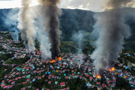 This aerial photo taken on October 29, 2021, show smokes and fires from Thantlang, in Chin State, where more than 160 buildings have been destroyed caused by shelling from Junta military troops, according to local media. 