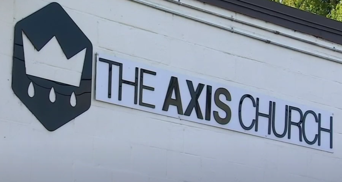 A sign hangs on the outside of The Axis Church in Nashville, Tennessee. 