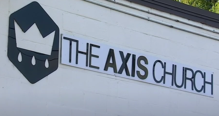 A sign hangs on the outside of The Axis Church in Nashville, Tennessee.
