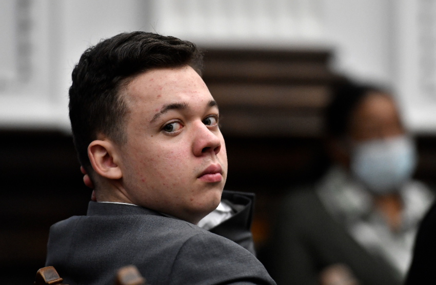 Kyle Rtttenhouse looks back as attorneys argue about the charges that will be presented to the jury during proceedings at the Kenosha County Courthouse on November 12, 2021 in Kenosha, Wisconsin.