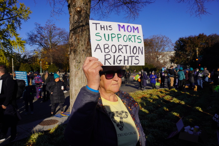 Dee Doyle expresses a pro-choice stance outside the U.S. Supreme Court building in Washington, D.C. on Dec. 1, 2021.