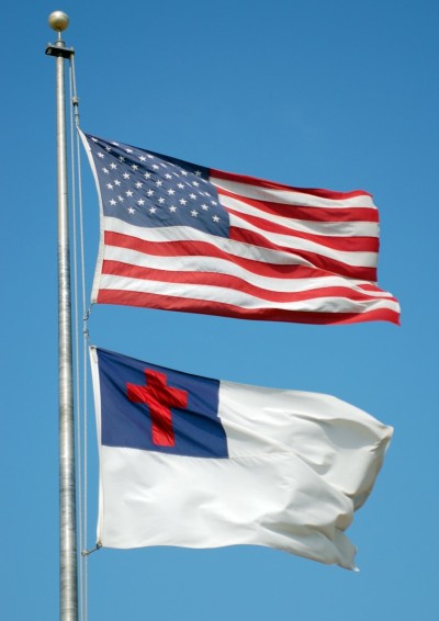 Christian flag and American flag flying together