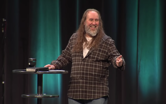 Pastor Bruxy Cavey preaches at The Meeting House in the Toronto suburbs in December 2019. 