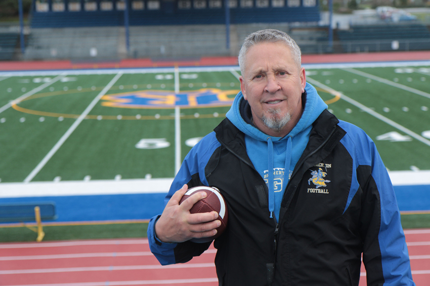 Coach Joe Kennedy at the Bremerton High School football field.