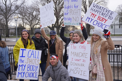 Protesters gather in front of the White House to express opposition to the city's COVID-19 vaccine mandate, Jan. 15, 2022.
