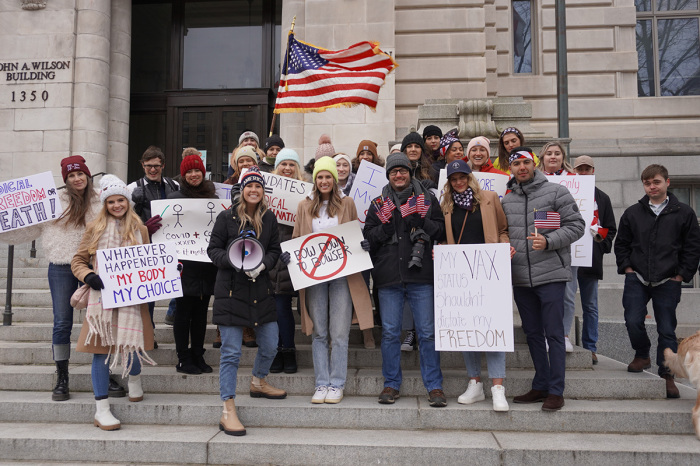 Protesters gather in front of the John A. Wilson Building, the office of Mayor Muriel Bowser, in opposition to the vaccine mandate in Washington, D.C., Jan. 15, 2022.