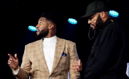 Pastor Michael Todd of Transformation Church in Tulsa, Oklahoma, makes a point about vision after lathering the eyes of a congregant with globs of his spit during a sermon on Jan. 16, 2022.