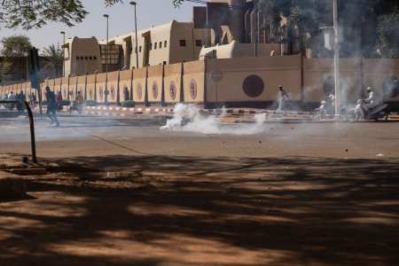Security forces fire tear gas at people who gathered at Nation square to support military in Ouagadougou on January 23, 2022.