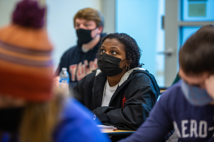 A student wears a mask amid the pandemic at Northwestern College in Orange City, Iowa, in 2021. The campus has had safety measures and protocols in place since 2020 in hopes of improving the safety of in-person learning. 