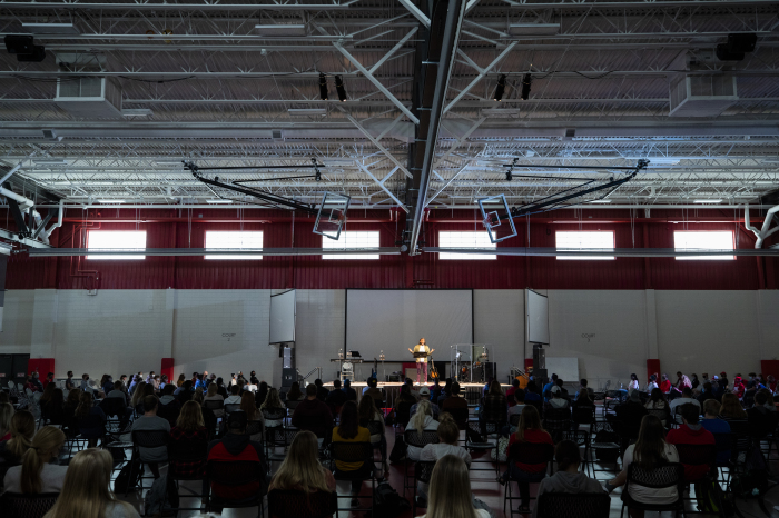 Christian hip-hop artist and writer Sho Baraka speaks during a chapel service at Northwestern College in Orange City, Iowa, in October 2020. To promote social distancing, chapel services were held for several months in the more expansive four-court area of the college's student center, rather than in Christ Chapel.