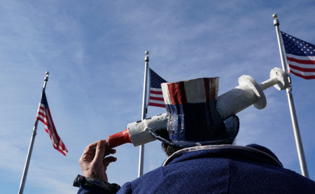 Demonstrators participate in a Defeat the Mandates march against vaccine mandates in Washington, D.C., on January 23, 2022.