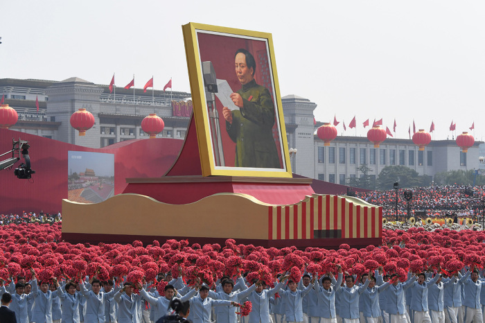 A giant portrait of former Chinese Communist Party leader Mao Zedong passes by Tiananmen Square during the National Day parade in Beijing on October 1, 2019, to mark the 70th anniversary of the founding of the People's Republic of China. 