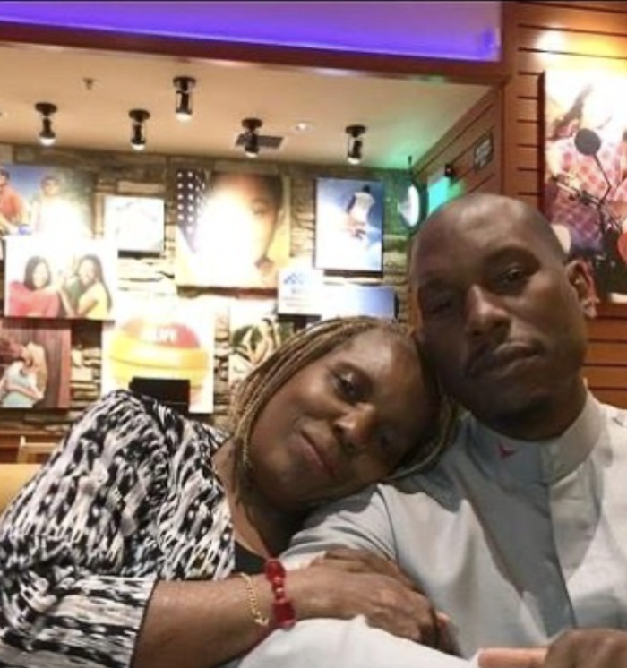 Tyrese Gibson sitting next to his mother, Priscilla Murray, in an undated image shared in February 2022.