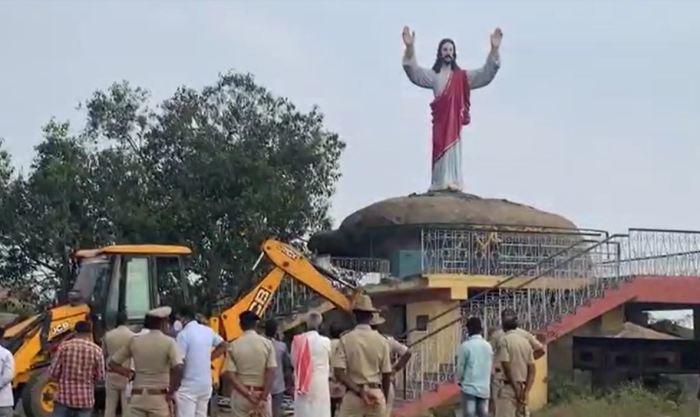 A 20-foot tall Jesus statue stands before it was demolished by the government in India's Karnataka state in February 2022. 