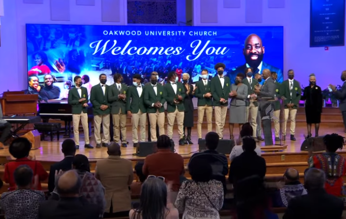 Members of the Oakwood Adventist Academy celebrated at Oakwood University Church in Huntsville, Ala., after forfeiting a semifinal game in an Alabama State tournament on Saturday, February 19, 2022.