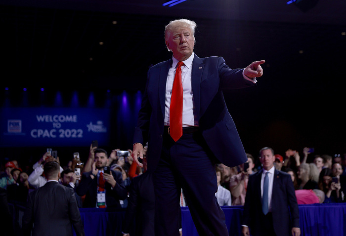 Former U.S. President Donald Trump gestures during the Conservative Political Action Conference (CPAC) at The Rosen Shingle Creek on February 26, 2022, in Orlando, Florida. CPAC, which began in 1974, is an annual political conference attended by conservative activists and elected officials.
