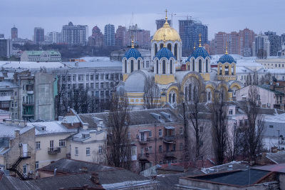 St. Volodymyr's Cathedral is seen against the city skyline during a curfew imposed from Saturday 5 p.m. to Monday 8 a.m. local time on Feb. 27, 2022 in Kyiv, Ukraine. Explosions and gunfire were reported around Kyiv as Russia's invasion of Ukraine continues. The invasion has killed scores and prompted widespread condemnation from US and European leaders. 