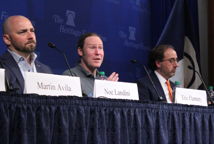 Eric Flannery (center), the owner of The Big Board in Washington, D.C., speaks about his opposition to coronavirus mandates at the Heritage Foundation headquarters in Washington, D.C., Mar. 2, 2022. 