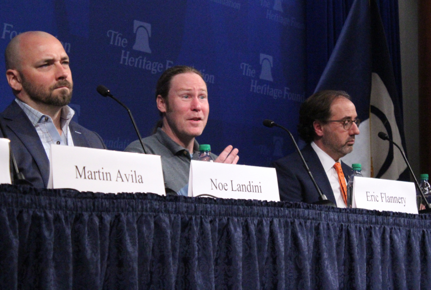 Eric Flannery (center), the owner of The Big Board in Washington, D.C., speaks about his opposition to coronavirus mandates at the Heritage Foundation headquarters in Washington, D.C., Mar. 2, 2022.