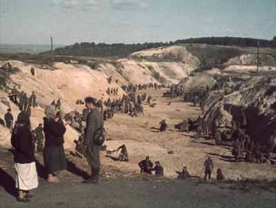 Soviet POWs covering a mass grave after the Babyn Yar massacre, October 1, 1941.