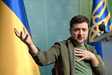 Ukrainian President Volodymyr Zelensky gestures as he speaks during a press conference in Kyiv on March 3, 2022. - Ukraine President Volodymyr Zelensky called on the West on March 3, 2022, to increase military aid to Ukraine, saying Russia would advance on the rest of Europe otherwise. "If you do not have the power to close the skies, then give me planes!" Zelensky said at a press conference. "If we are no more then, God forbid, Latvia, Lithuania, Estonia will be next," he said, adding: "Believe me." 