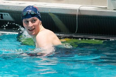 University of Pennsylvania swimmer Lia Thomas smiles after winning the 100-yard freestyle during the 2022 Ivy League Womens Swimming and Diving Championships at Blodgett Pool on February 19, 2022, in Cambridge, Massachusetts. 