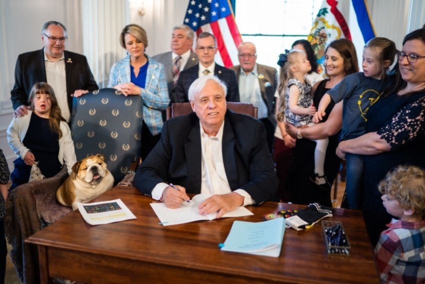 West Virginia Gov. Jim Justice signs two bills into law on Monday, March 21, 2022. One of them prohibits most abortions on unborn babies that have disabilities, such as Down Syndrome.