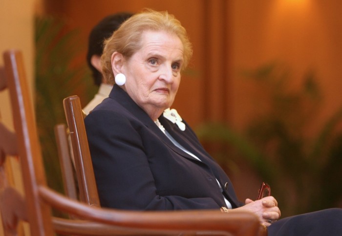 Former US Secretary of State Madeleine Albright listens as the unseen Chief Mentor of The Confederation of Indian Industry (CII) Tarun Das addresses a meeting in New Delhi, 05 September 2006. Albright delivered a speech on 'America, India and democracy in the 21st Century'.