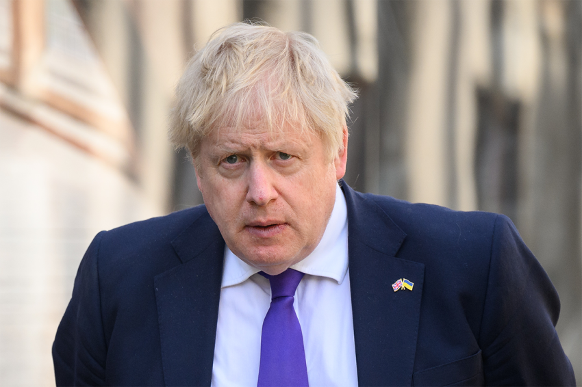 Prime Minister Boris Johnson walks to his car following a memorial service for those killed in the Westminster terror attack, March 22, 2022, in London, England. 