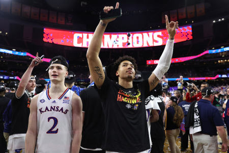 Christian Braun #2 and Jalen Wilson #10 of the Kansas Jayhawks celebrate after defeating the North Carolina Tar Heels during the 2022 NCAA Men's Basketball Tournament National Championship at Caesars Superdome on April 04, 2022 in New Orleans, Louisiana.