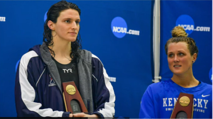 University of Kentucky swimmer Riley Gaines (right) poses next to Lia (formerly Will) Thomas after the two athletes tied for fifth place at an NCAA Women's Swimming Championship, March 17, 2022.