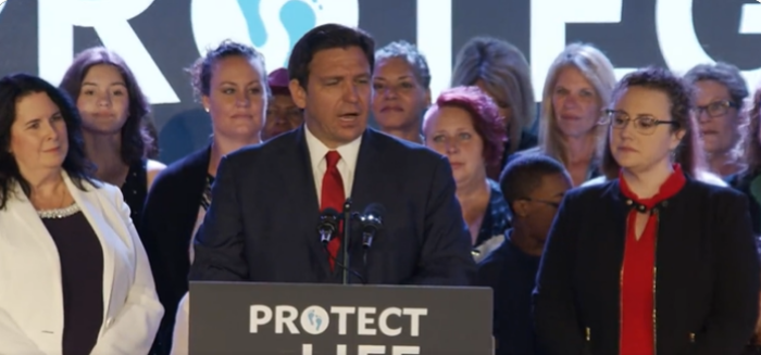 Florida Gov. Ron DeSantis delivers remarks in Kissimmee, Florida, at a signing ceremony for House Bill 5, which bans abortions after 15 weeks gestation, April 14, 2022.