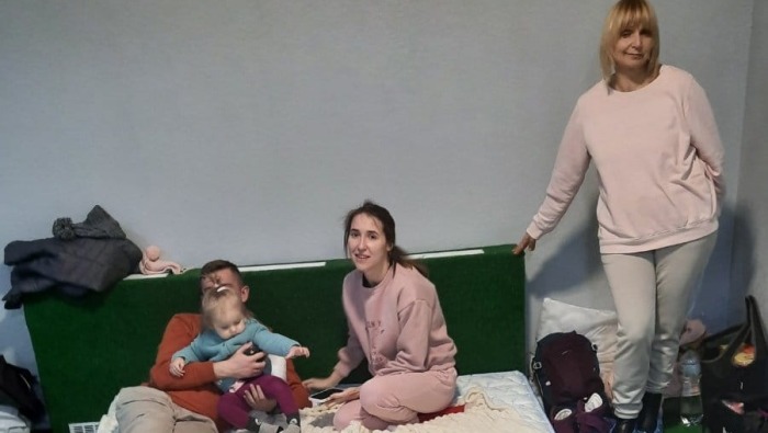 Ukrainians forced from their homes due to the ongoing Russia-Ukraine conflict take refuge in the basement of the Ukrainian Christian Sport Academy in the suburbs of Kyiv. The facility is operated by Sergey and Ellina Lesnik. While Sergey is on the ground in eastern Europe, Ellina is in the United States working to raise money for relief efforts. 