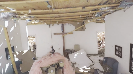 The cross at First Cedar Valley Baptist Church in Salado, Texas, remains intact after a tornado destroyed most of the church building and caused the ceiling to cave in on April 13, 2022. Most of the rubble that remained of the building has since been cleared out while the cross remains.