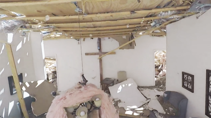 The cross at First Cedar Valley Baptist Church in Salado, Texas, remains intact after a tornado destroyed most of the church building and caused the ceiling to cave in on April 13, 2022. Most of the rubble that remained of the building has since been cleared out while the cross remains. 