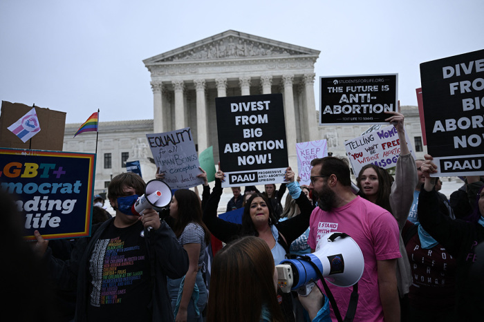 Pro-life and pro-choice demonstrators gather in front of the U.S. Supreme Court in Washington, D.C., on May 3, 2022. 