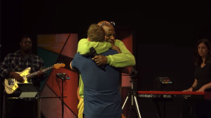 Walter Hooker, the senior associate pastor of Bellevue Christian Center in Bellevue, Nebraska, embraces his lead pastor, Andy Kaup, who will donate a life-saving kidney to him on Aug. 2. 2022.