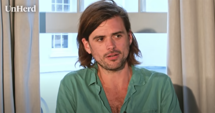 Musician Winston Marshall, the former banjo player for the British band Mumford & Sons, speaks to Freddie Sayers at an UnHerd live event shared on YouTube on Aug. 2, 2021. 