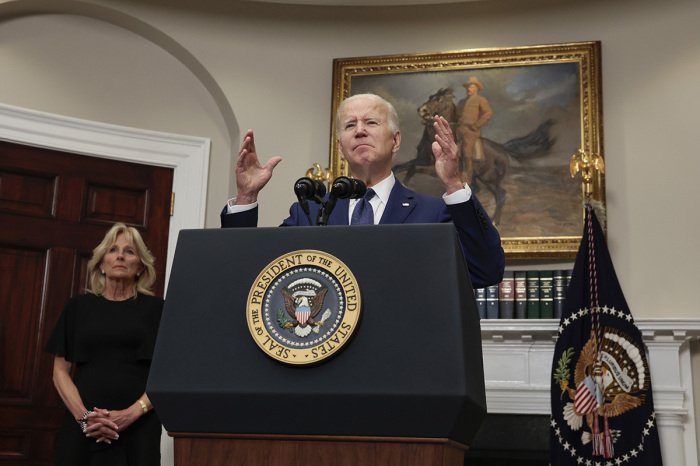 President Joe Biden delivers remarks from the Roosevelt Room of the White House as first lady Jill Biden looks on concerning the mass shooting at a Texas elementary school on May 24, 2022, in Washington, D.C. As many as 19 students and one teacher are dead after a gunman today opened fire at the Robb Elementary School in Uvalde, Texas, according to published reports. 
