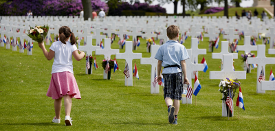 Dutch children visit U.S. war cemetery in Margraten during Memorial Day in Margraten on May 24, 2015.