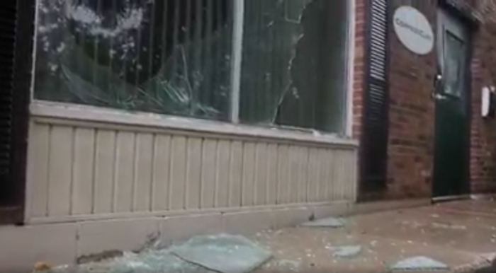 Shattered glass from a window lies outside the CompassCare clinic in Buffalo, New York, on June 7, 2022, that was firebombed in one of many acts of vandalism to take place ahead of an expected U.S. Supreme Court decision in an abortion case. 