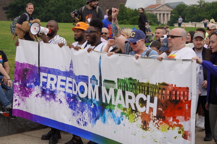 A crowd of supporters march in the Freedom March that culminated in worship and testimonies being shared at the Sylvan Theater in Washington, D.C., on June 11, 2022. 